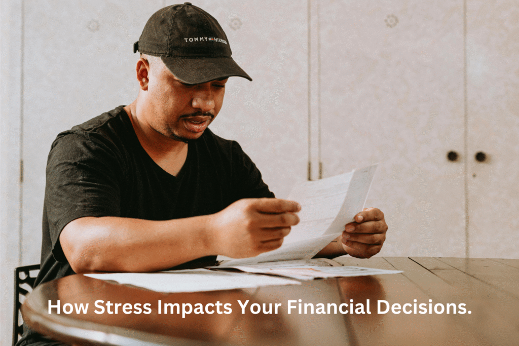 Person managing bills and finances, illustrating how stress impacts financial decisions.